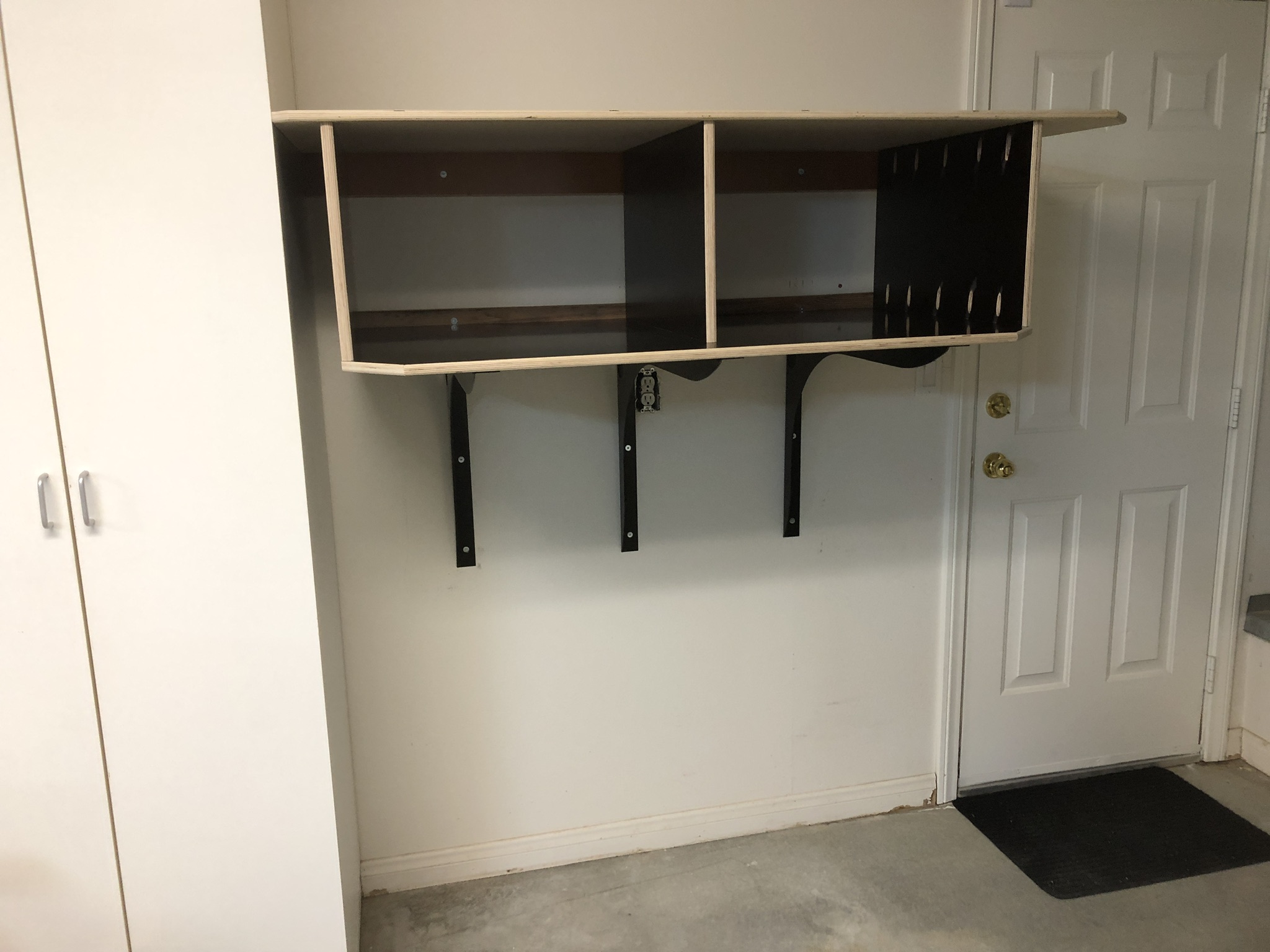 Custom shelving build by Sky Harbor Woodshop